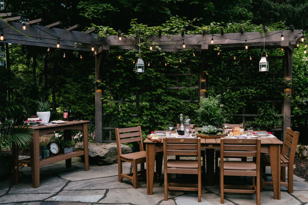 Outdoor dining setup featuring Amish made wooden furniture.