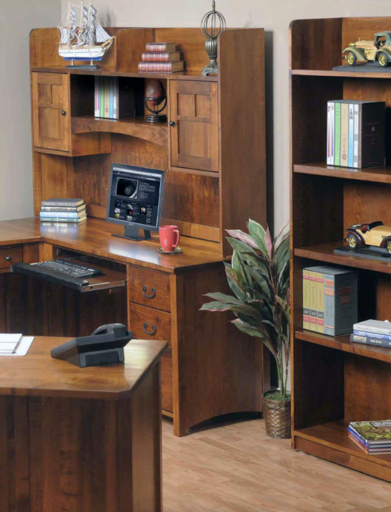 A handcrafted Amish office setup featuring a wooden desk with hutch, matching bookshelf, and ample storage in a warm cherry finish. A beautiful example of high-quality office furniture available in Hamptonville.